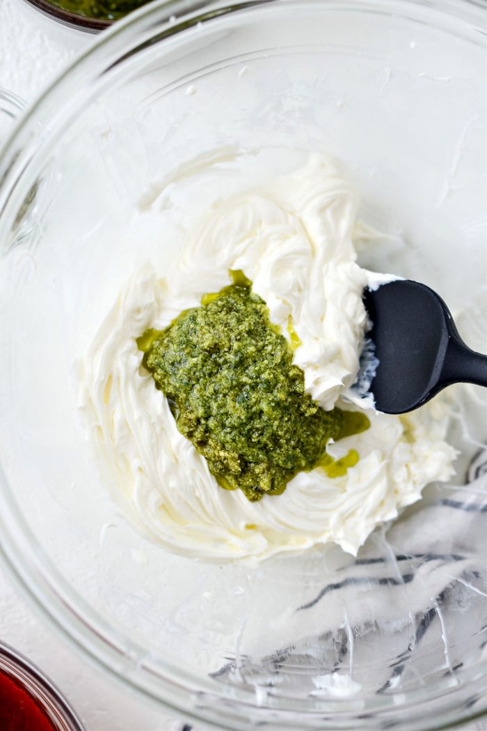 basil pesto added to whipped cream cheese