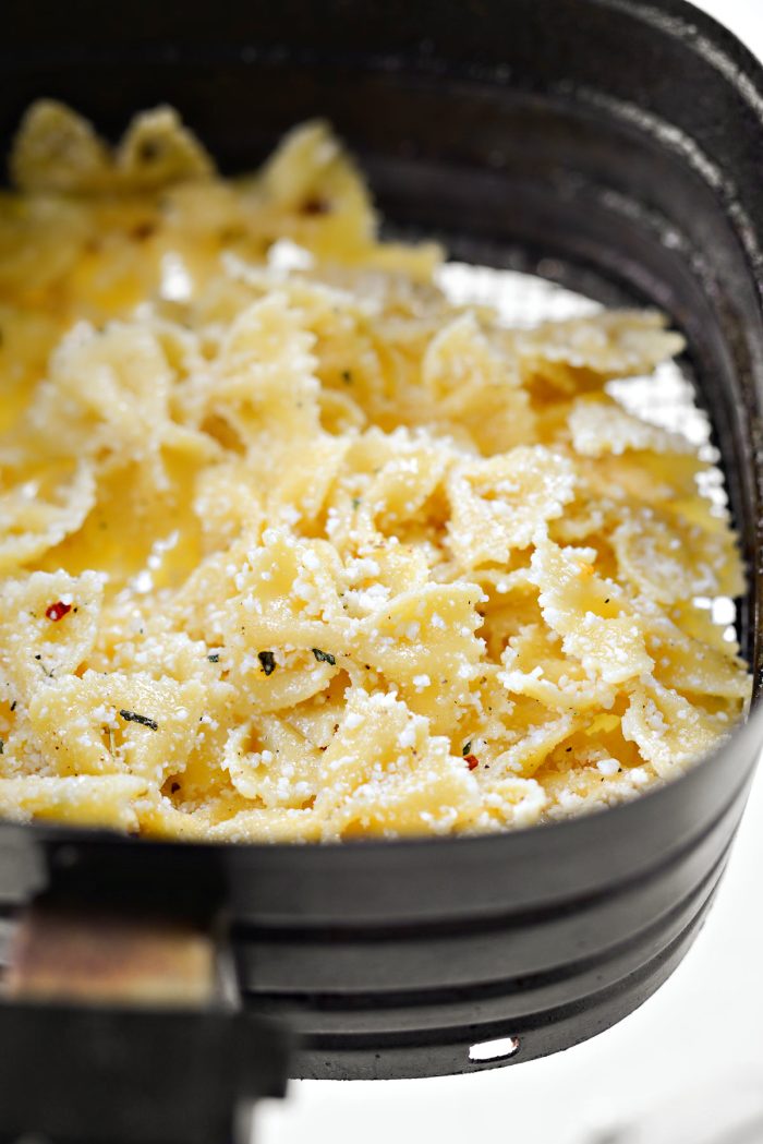 add seasoned pasta to the air-fryer basket