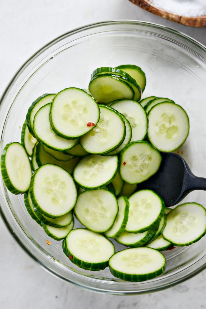 cucumbers tossed in dressing