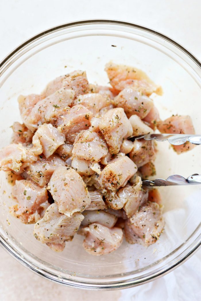 toss chicken pieces in marinade