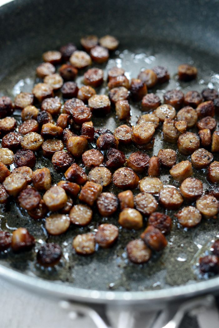 crispy sliced breakfast sausage in skillet