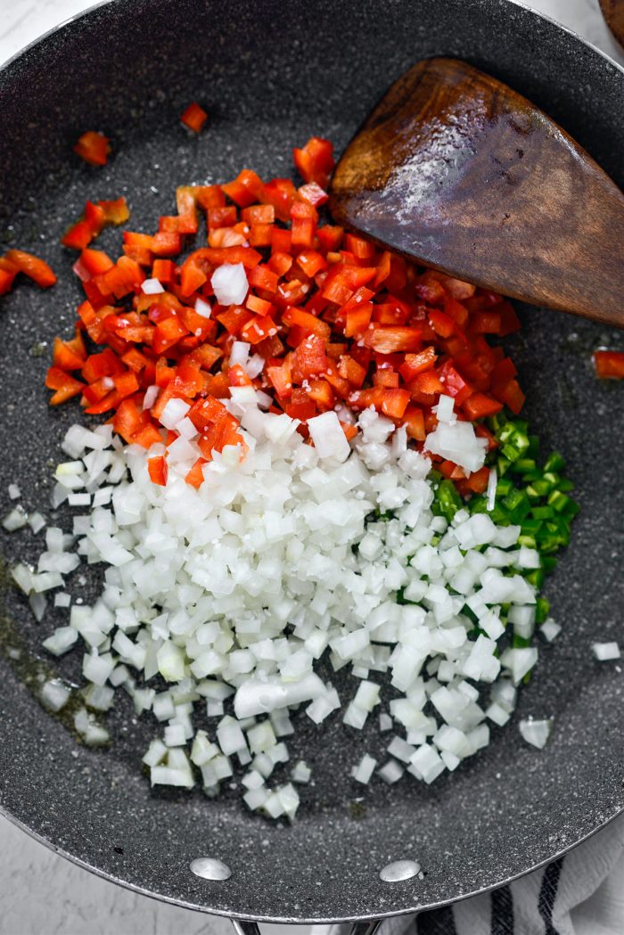 peppers and onions in skillet