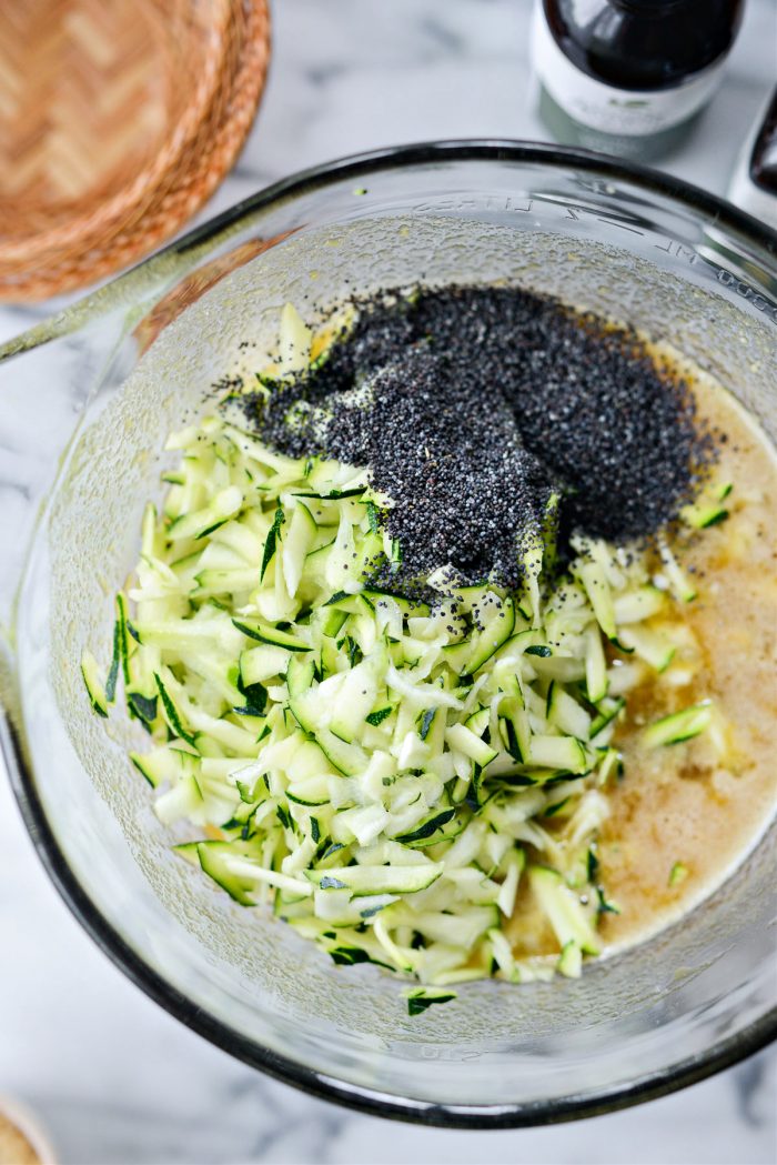 add grated zucchini and poppy seeds