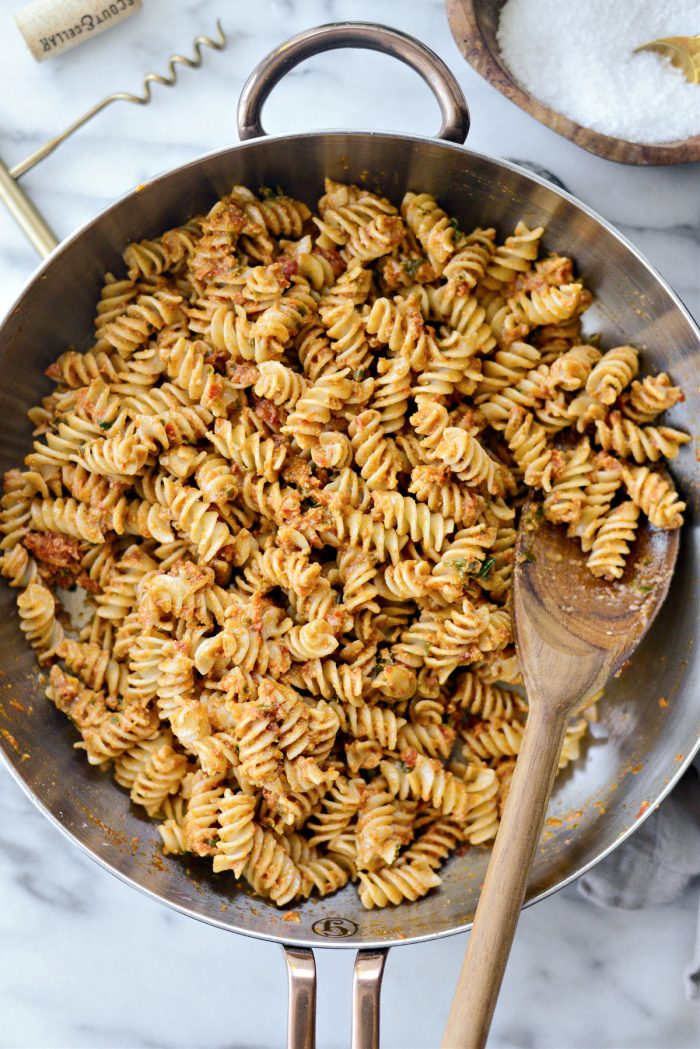 saucy pesto pasta in skillet