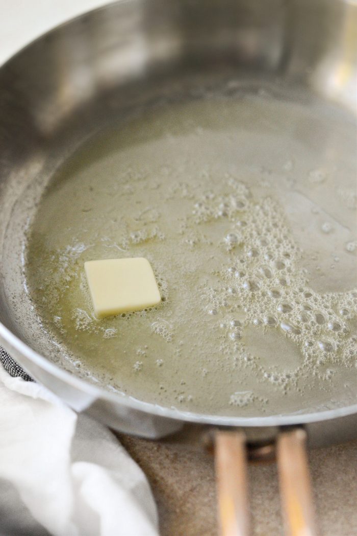 butter sizzling in a pan