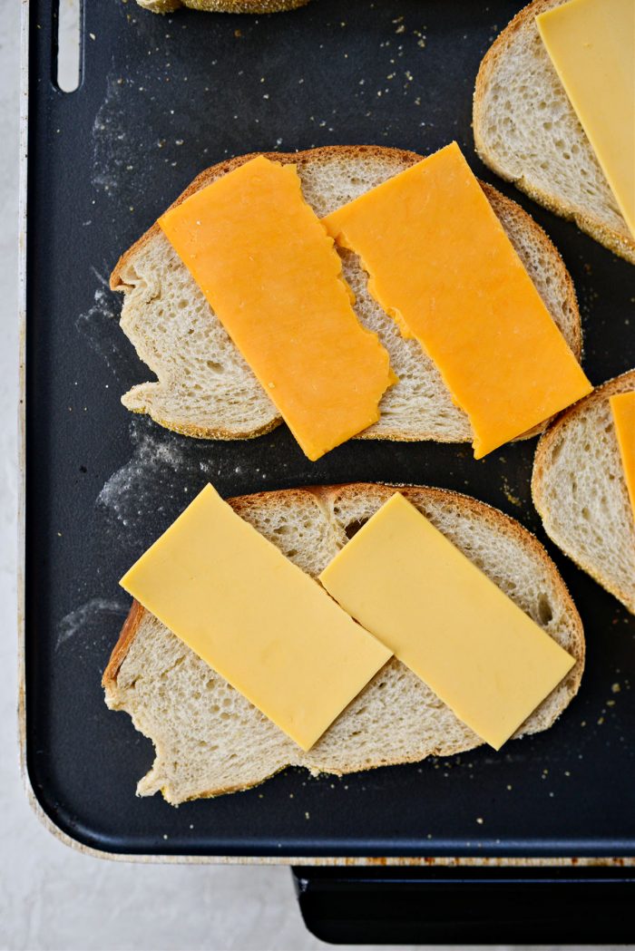 rye bread and cheese on griddle