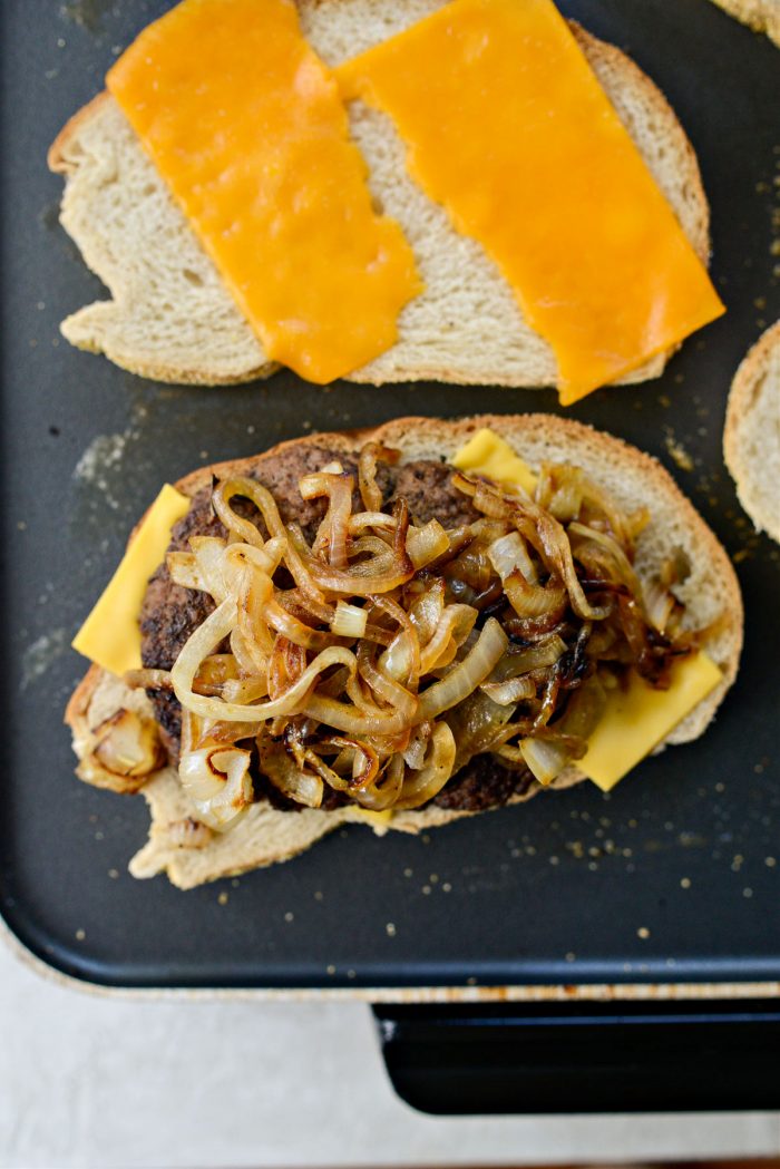 top bread with beef patty and onions