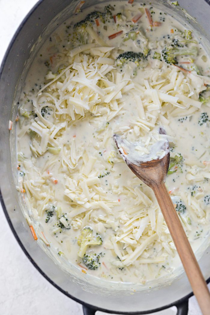 stir in freshly grated cheddar cheese