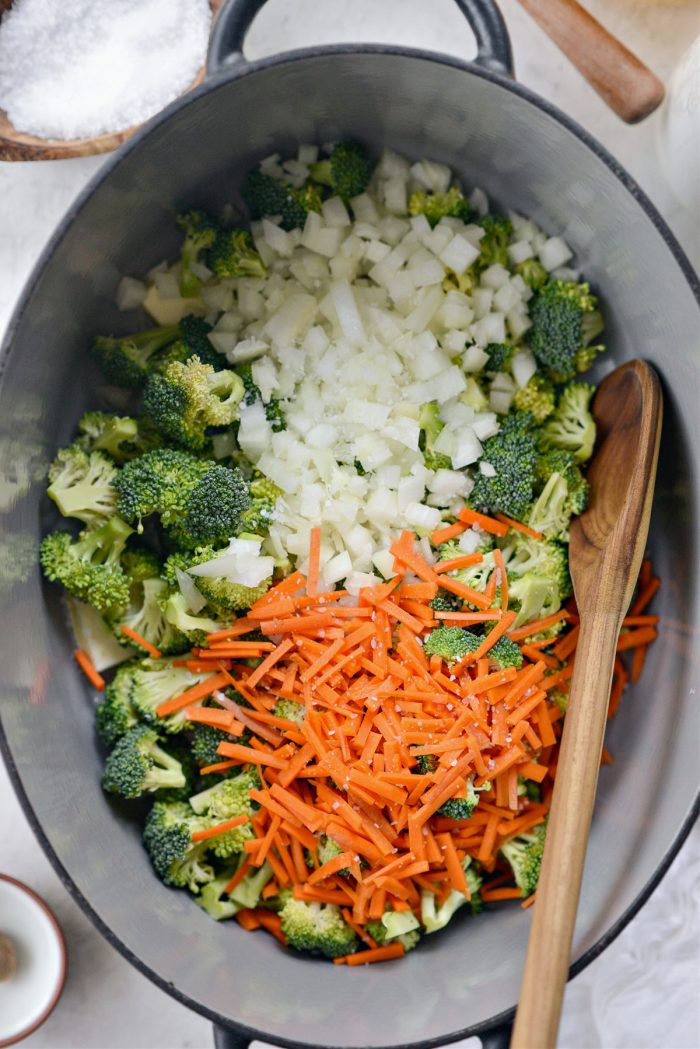 add broccoli, onions and carrots with a pinch of salt