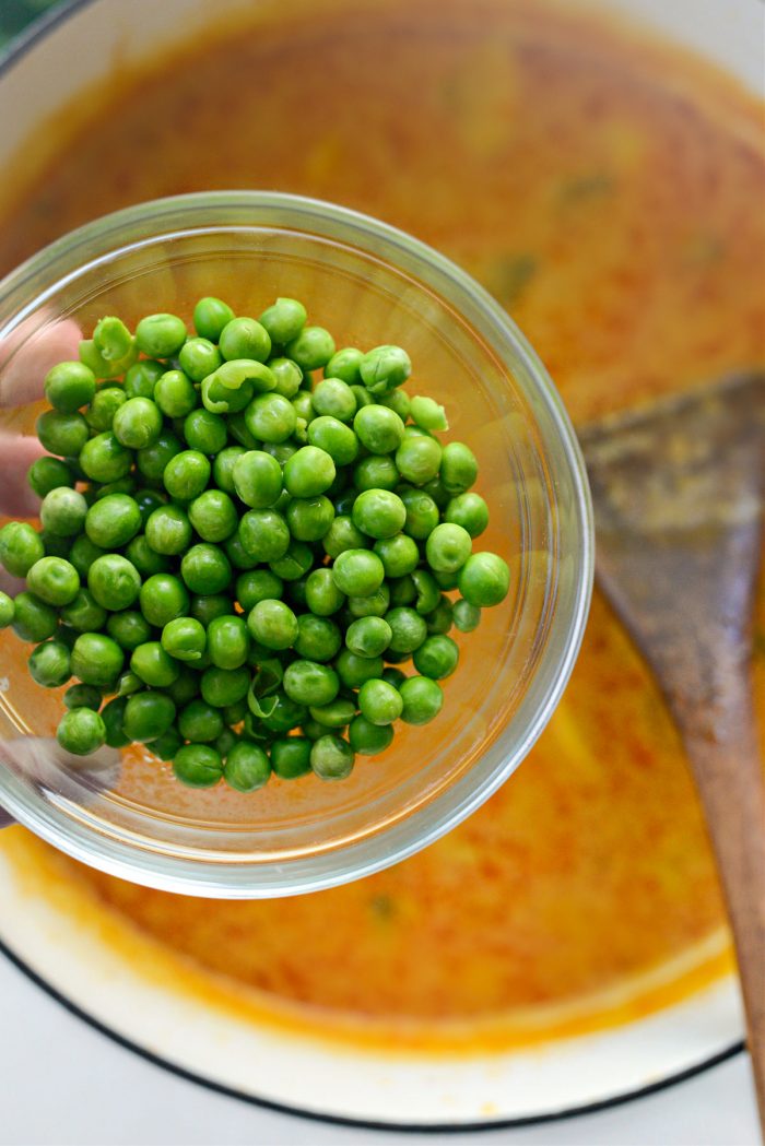 add peas and season with salt