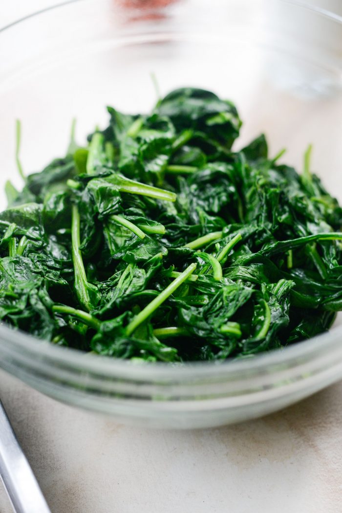 wilted spinach in bowl