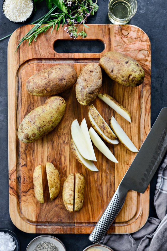 wash and cut potatoes into eighths