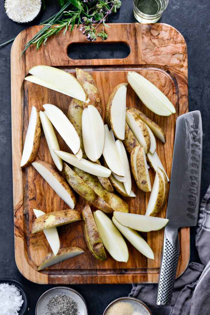 cut potatoes on cutting board