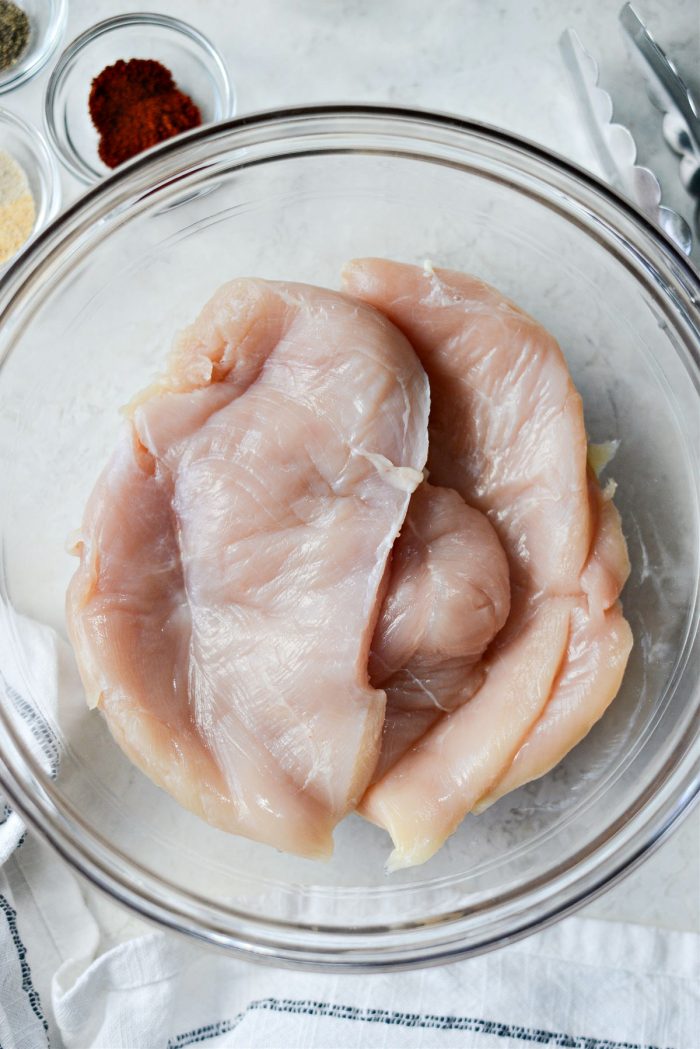 add pounded chicken breasts to bowl