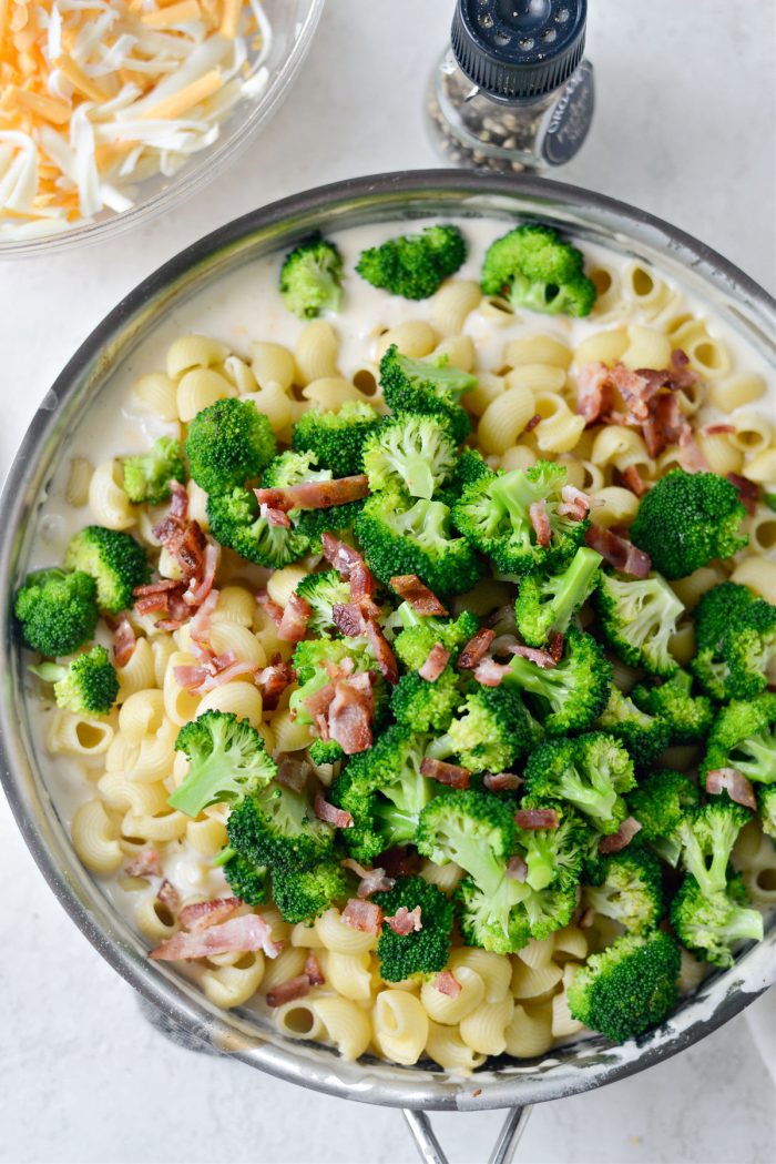 add blanched broccoli and most of the cooked chopped bacon