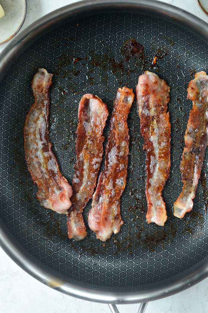 cooking bacon in skillet