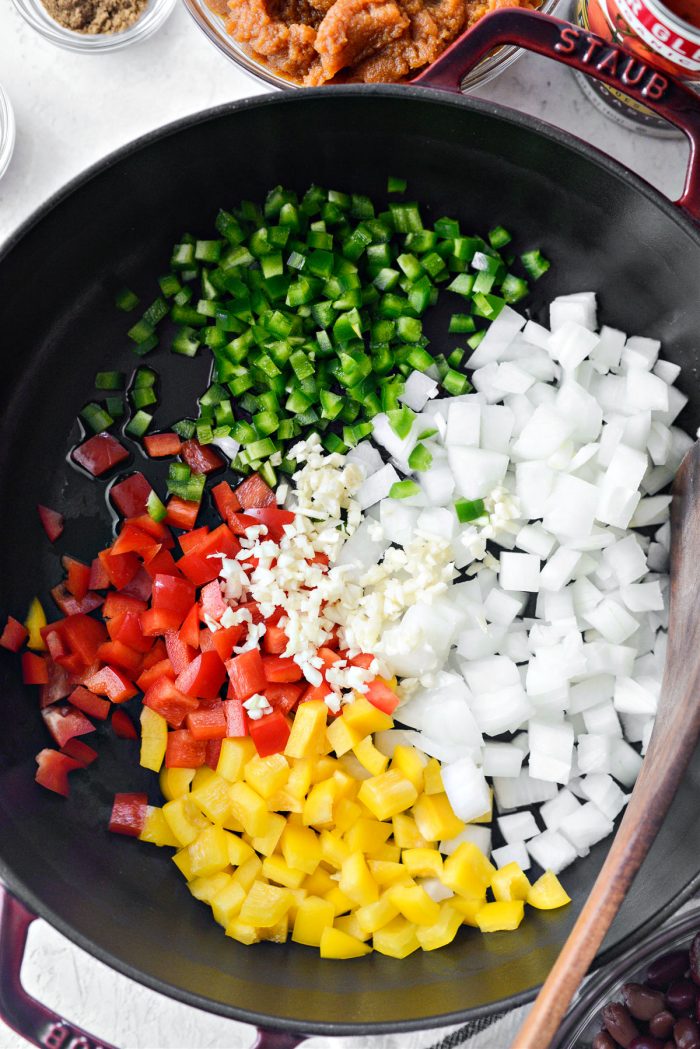 oil, peppers, onions and garlic in pot