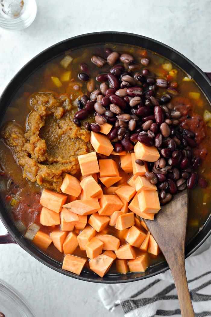 add broth, fire roasted tomatoes, pumpkin puree, beans and diced sweet potato