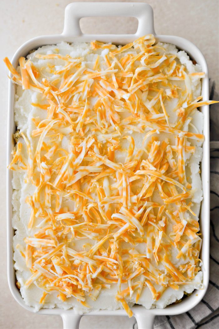 top with shredded cheese