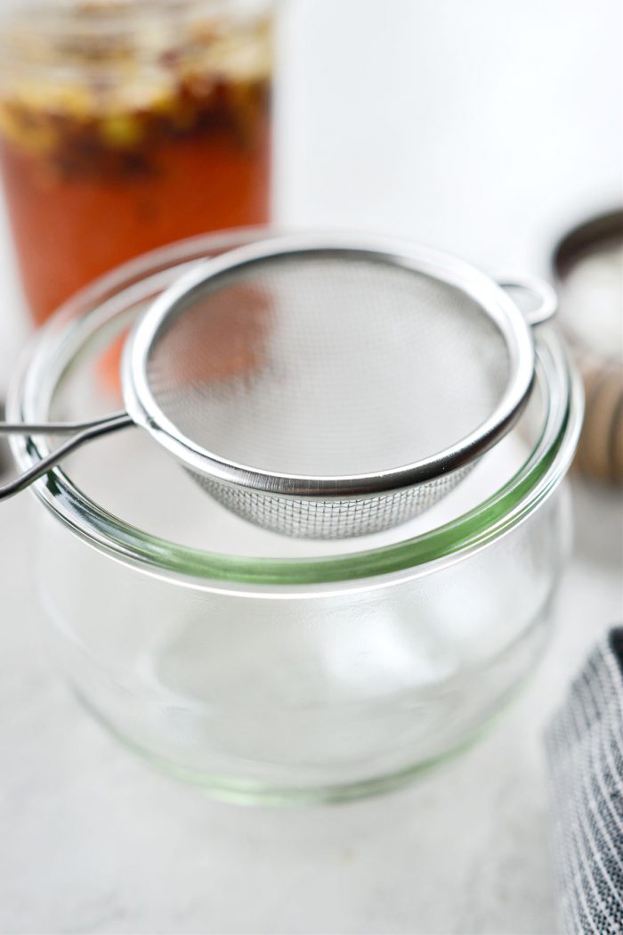 set a sieve over a jar