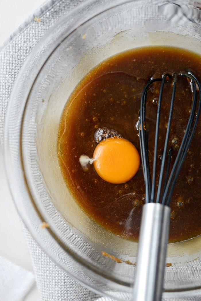 gradually whisk in 1 egg at a time