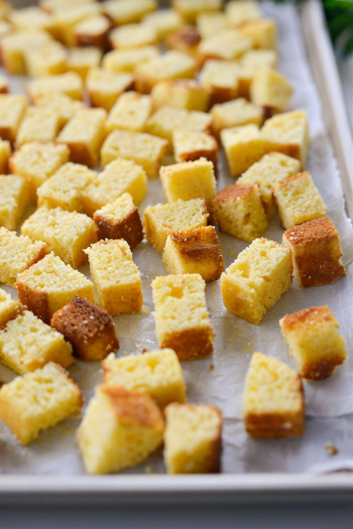 cornbread cubes on sheet pan