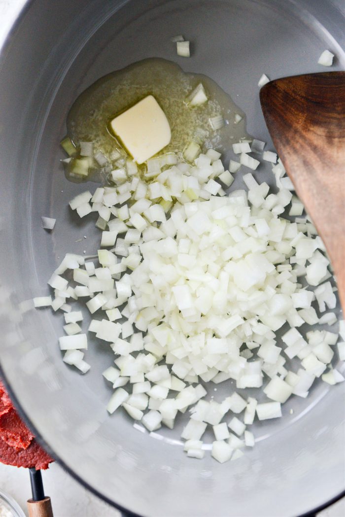 butter and onions in dutch oven