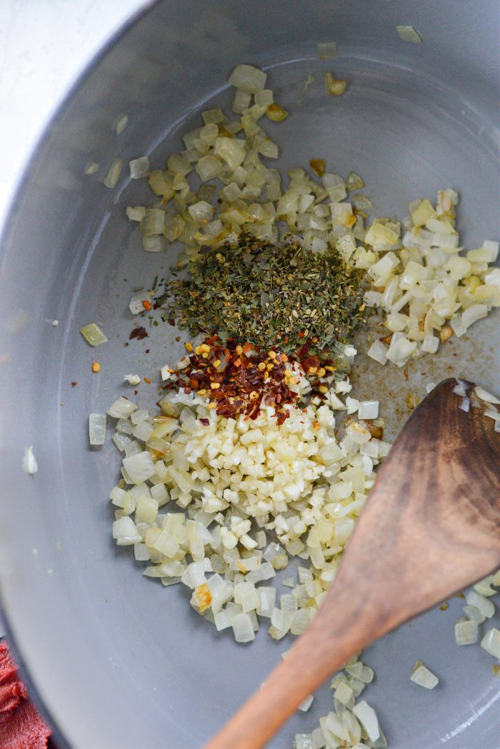 add garlic, pepper flakes and italian seasoning to sauteed onions