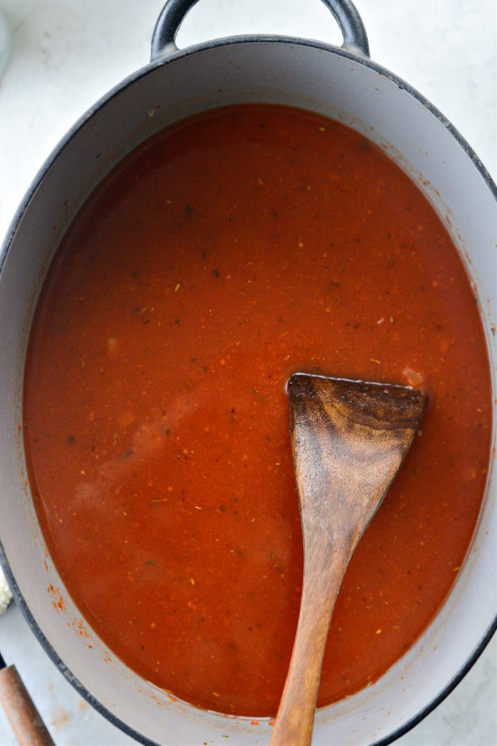stir in crushed tomato