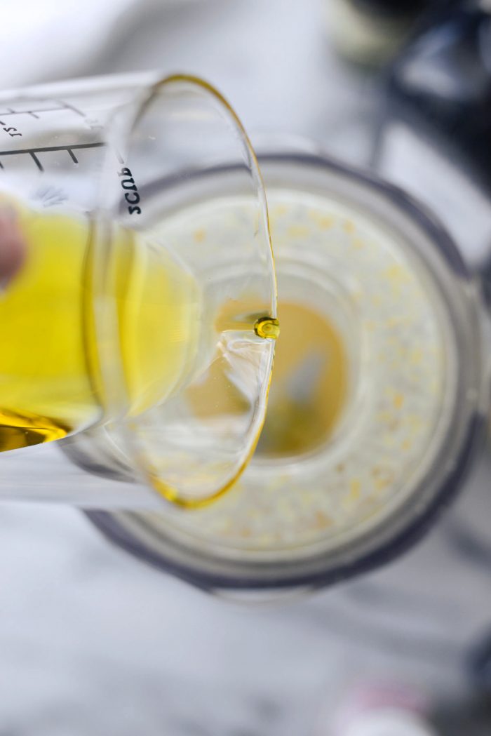 with blend on, pour in olive oil 