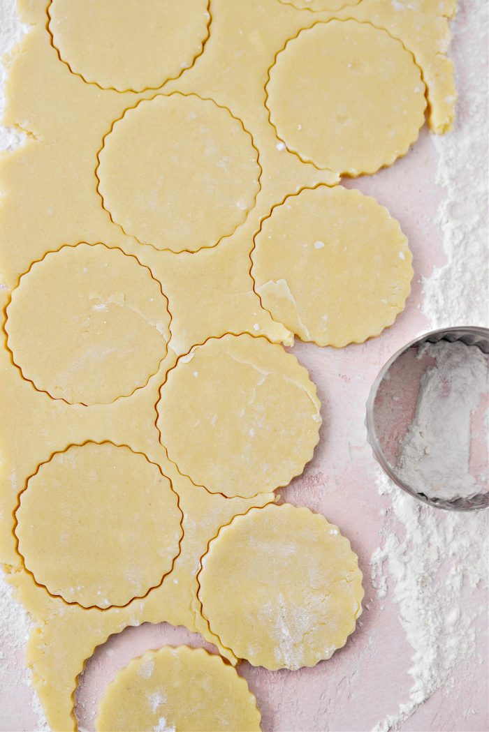 stamp out cookies with round biscuit or cookie cutter