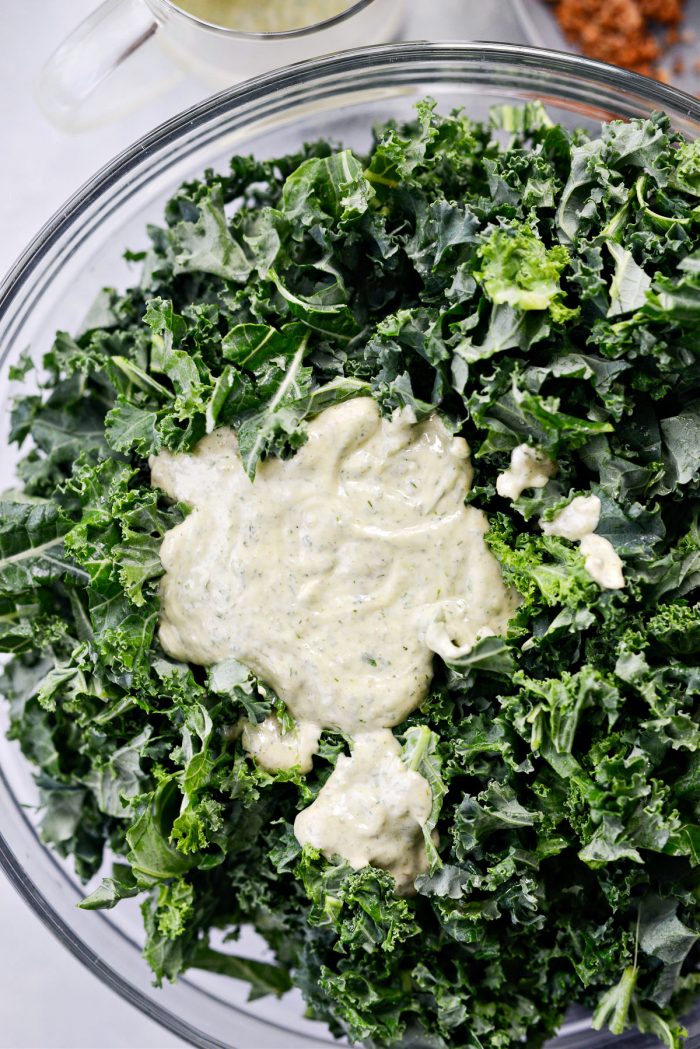 add dressing to kale