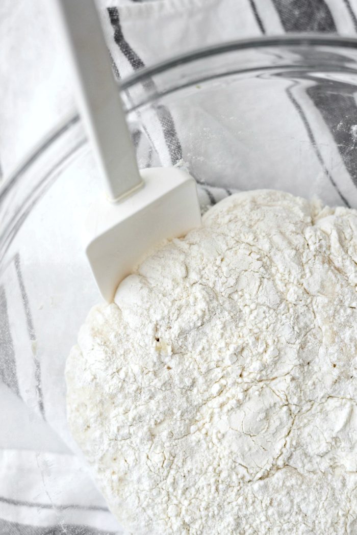 Scrape the sides of the bowl with a spatula