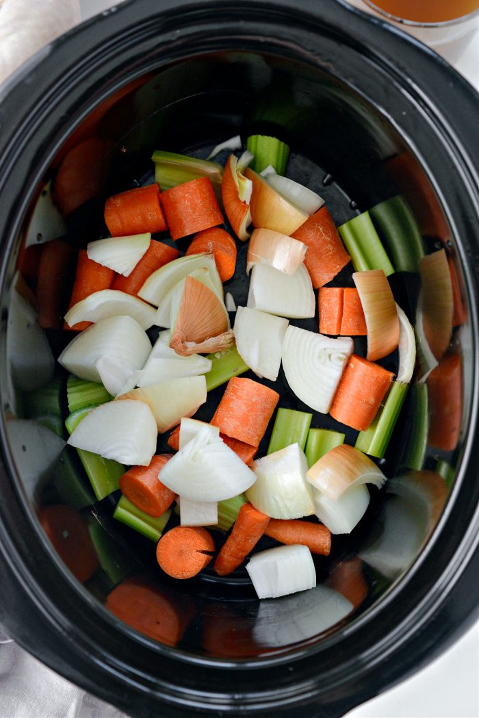 chopped veggies in the slow cooker