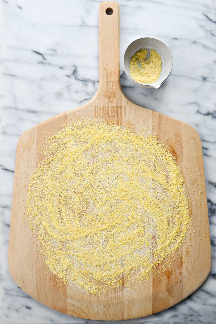 pizza peel with cornmeal