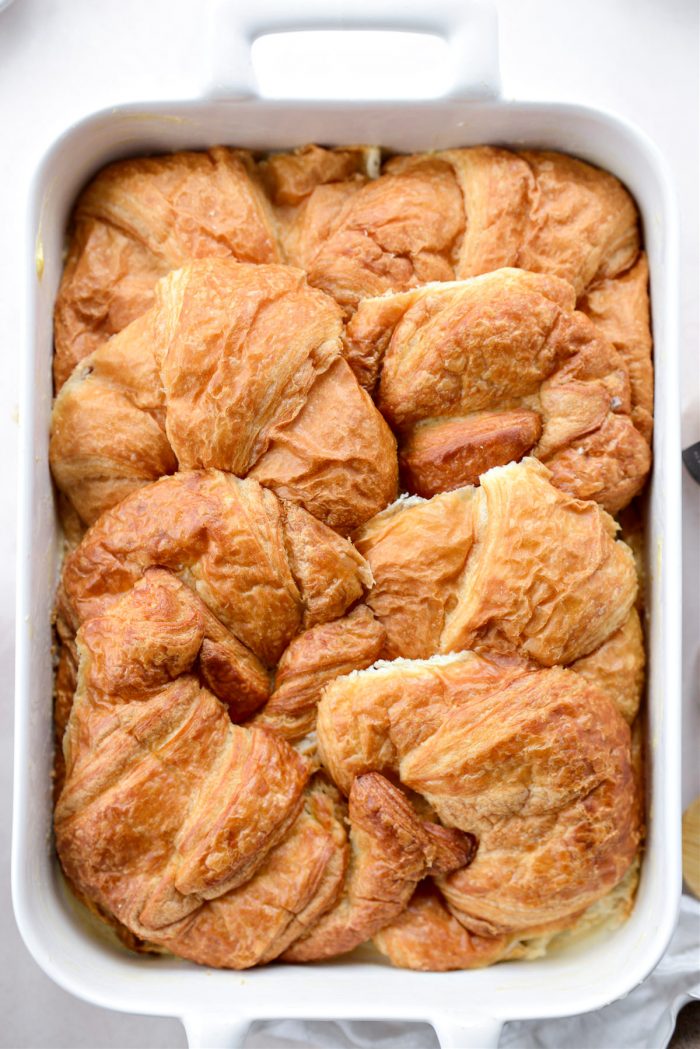 top with the top halves of croissants