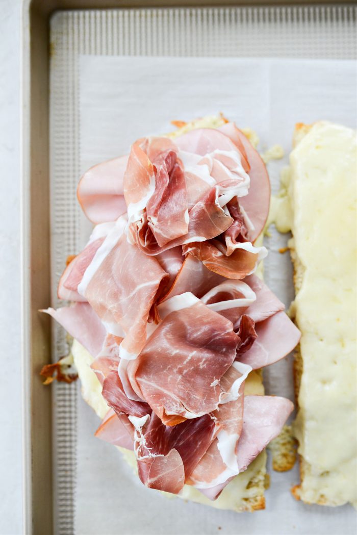 top bottom half with ham and prosciutto