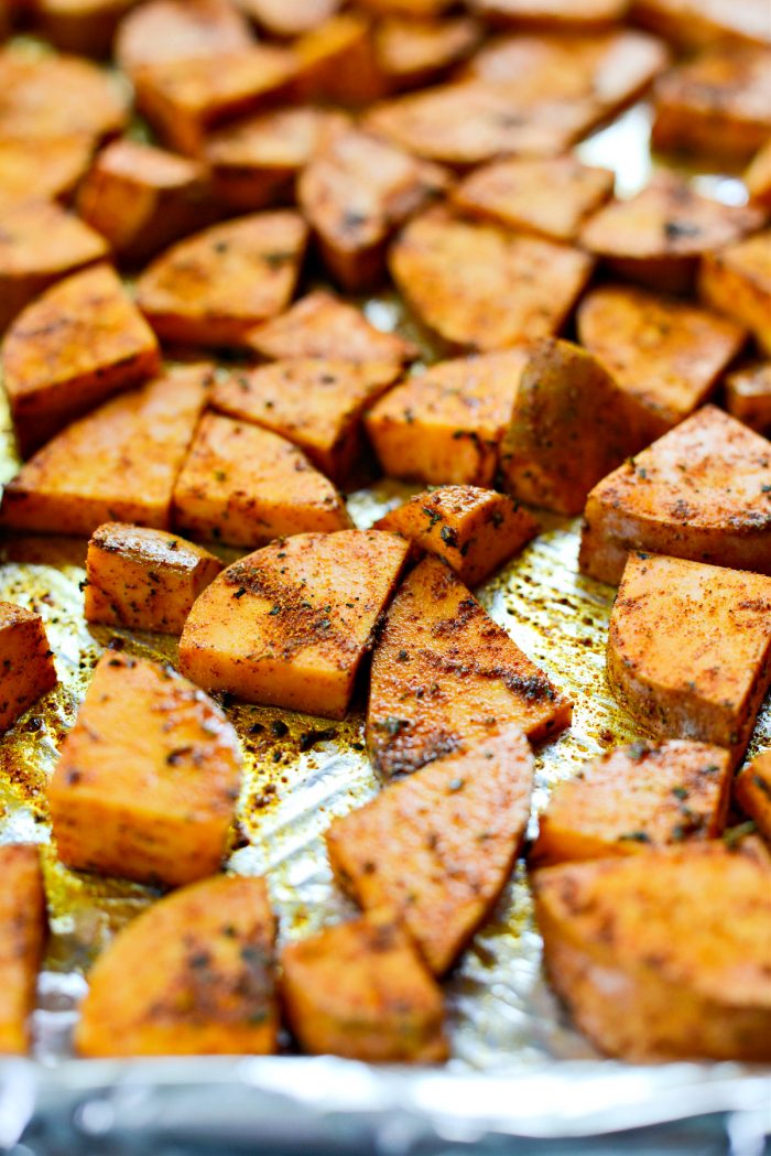 toss sweet potatoes in oil and spices