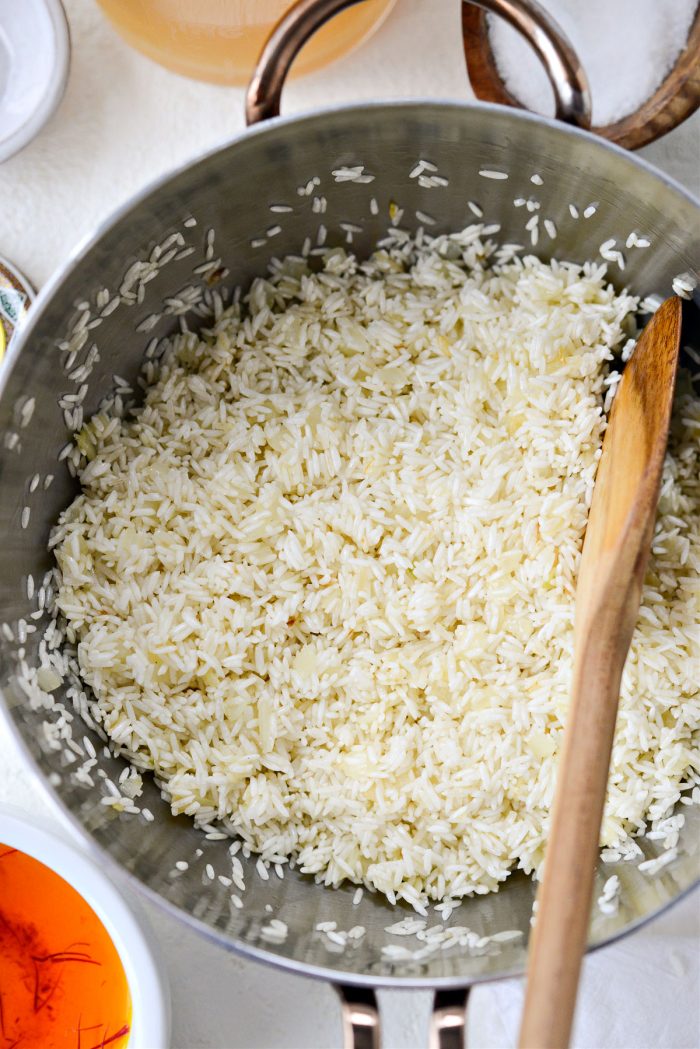 stir rice in with onions and cook 3 minutes