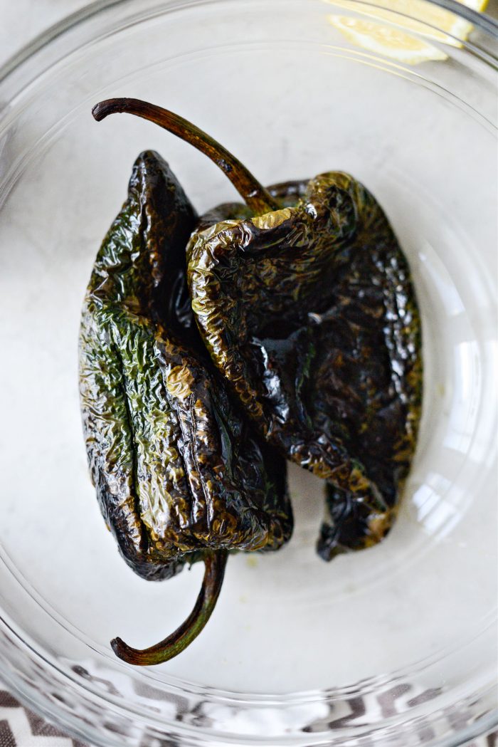 charred poblanos in a bowl