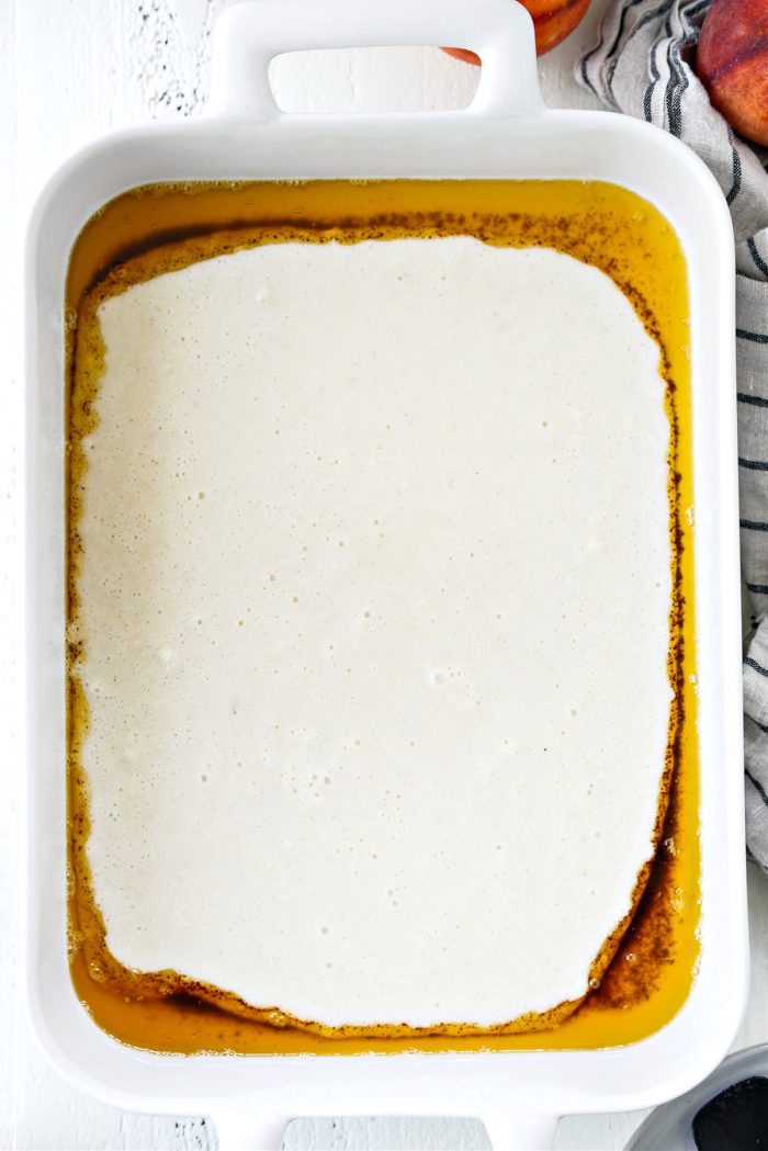 browned butter with batter in baking dish