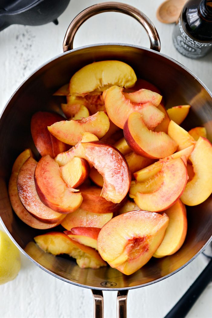sliced peaches in saucepan