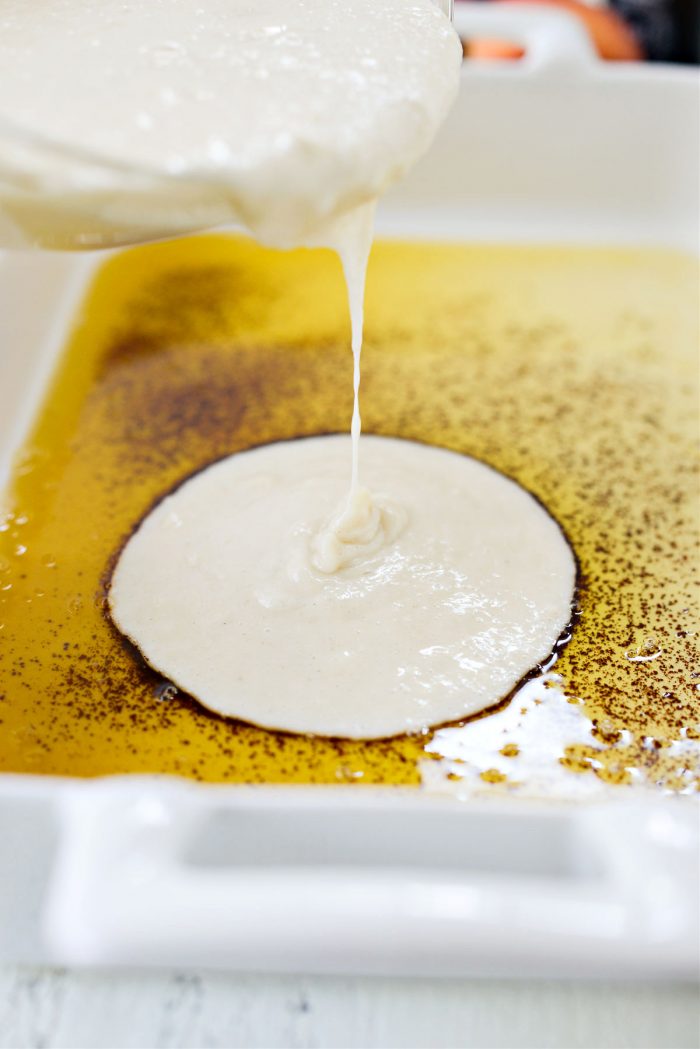 pouring batter in baking dish