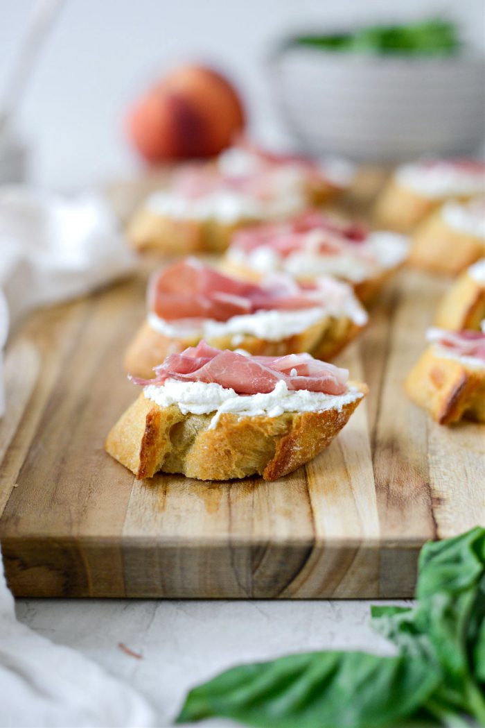 Top with pieces of prosciutto
