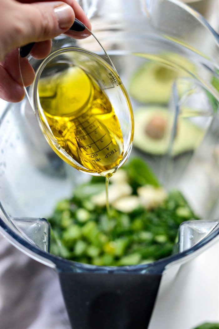 pouring in olive oil