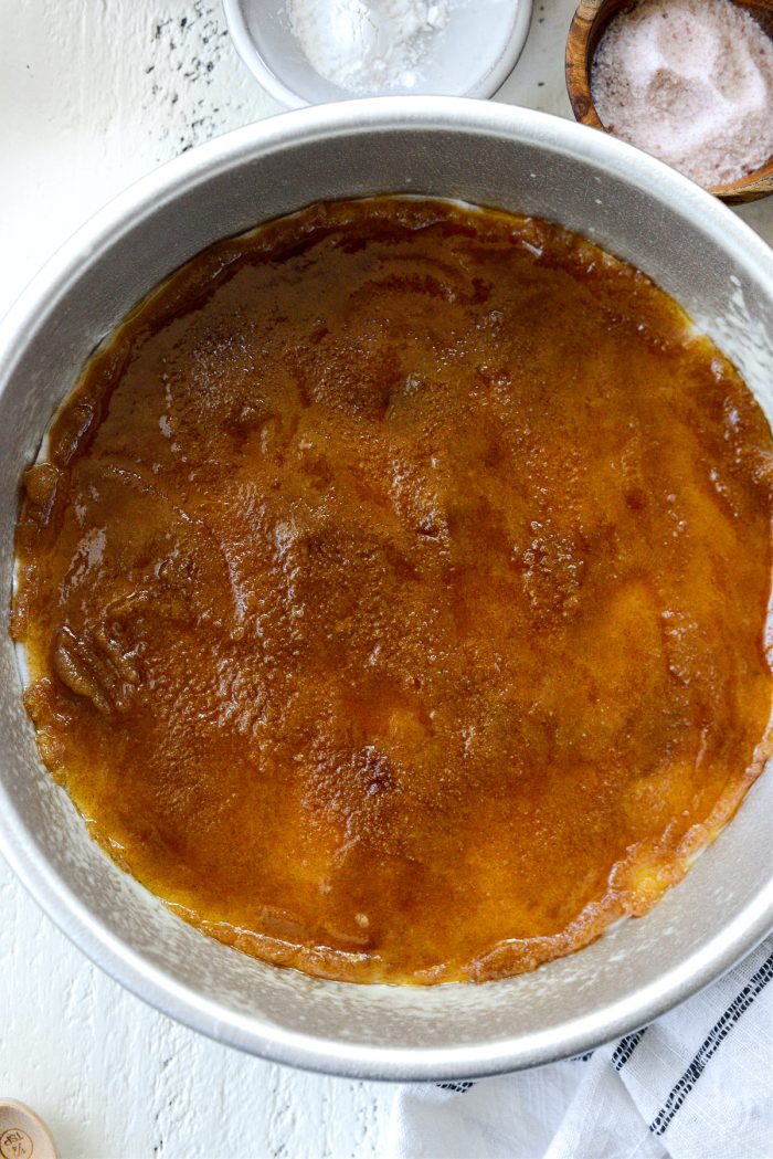 spread butter and brown sugar mixture on bottom of prepare pan