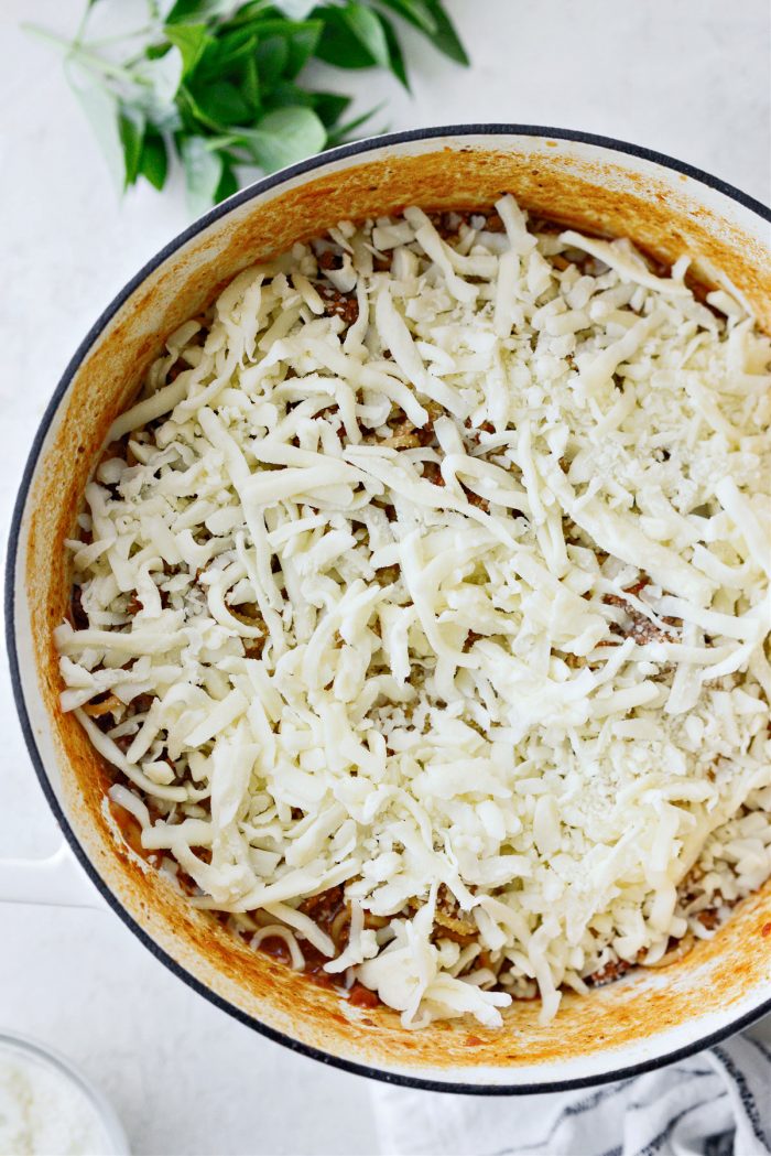 top with shredded mozzarella