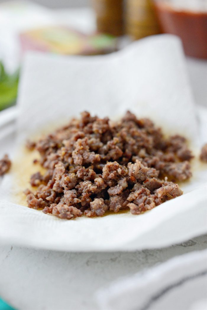 browned italian sausage on paper towel lined plate