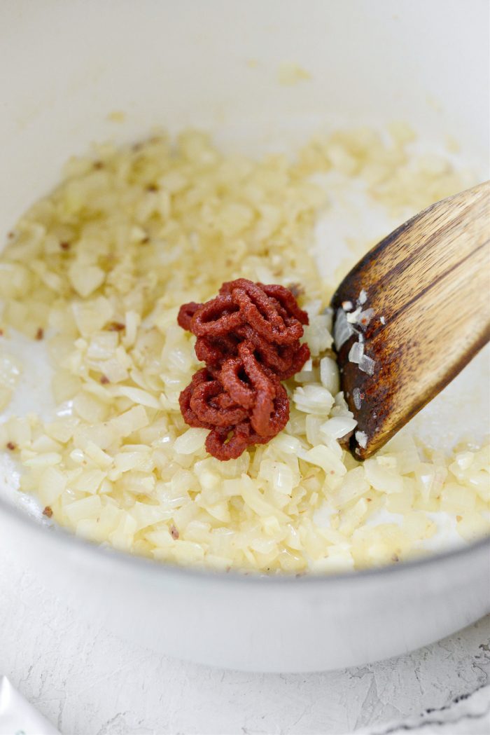 tomato paste added to sauteed onions and garlic