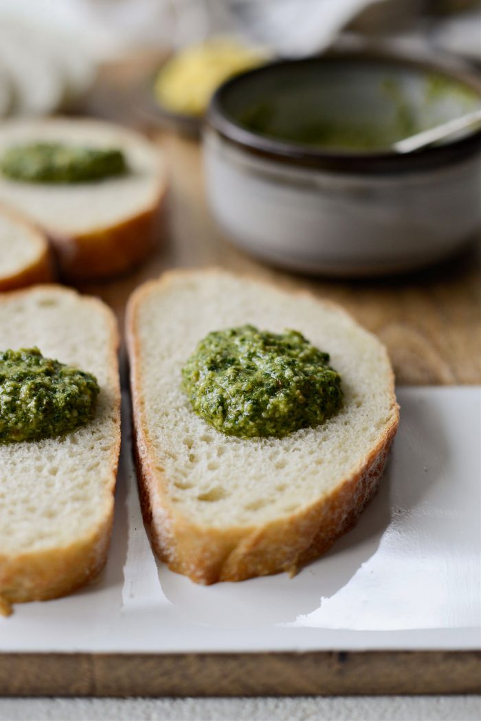 pesto on slices of sturdy bread